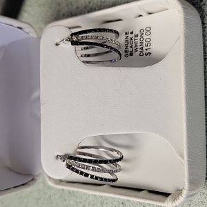 Brand new, never worn black and silver hoop earrings.